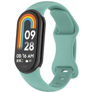 Replacement silicone wristband strap for smart fitness tracker, mint green color design.