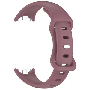 Silicone replacement watch band detail view with metal connectors for smart fitness tracker.