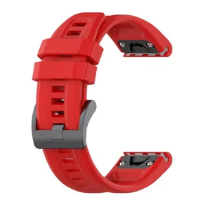 Red silicone replacement smartwatch strap detail with black buckle and quick release mount.