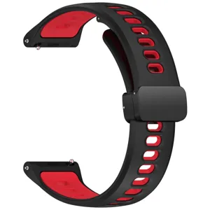 Dettaglio cinturino orologio in silicone, design traspirante con perni a sgancio rapido.
