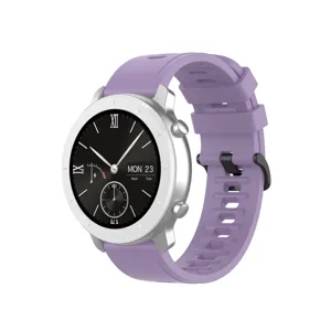 Close-up detail of the purple silicone smartwatch strap featuring silver case and black dial.
