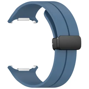 Silicone magnetic folding buckle watch strap detail view, flexible blue band texture.