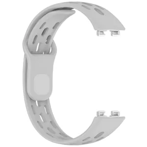 Gray silicone replacement watch band with breathable honeycomb holes and metal connector pins.