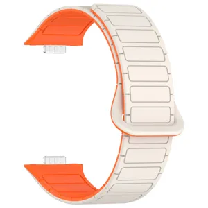 Replacement silicone watch band with tubular design and magnetic buckle in beige and orange.