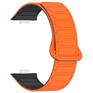 Close-up view of vibrant orange silicone magnetic watch strap replacement band detail.