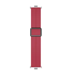 Red silicone watch strap detail view, featuring a secure magnetic folding buckle design.