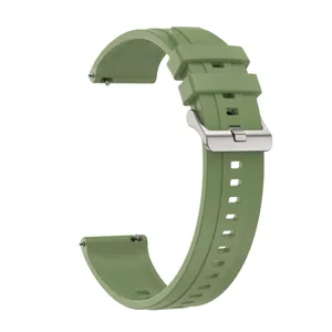 Green silicone smartwatch replacement band detail view showing quick release pin and buckle.