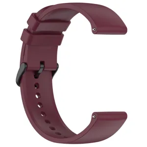 Silicone watch strap detail showing the smooth texture, secure black buckle and quick release pin.