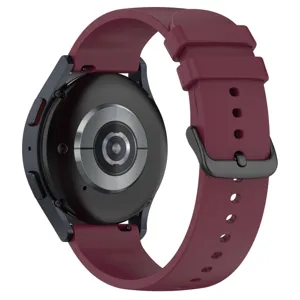 Silicone watch strap detail view, burgundy color with secure metal buckle, durable fit.