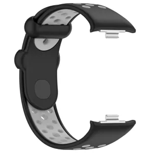 Vue détaillée du bracelet de sport TPU bicolore avec connecteur métallique pour montre.