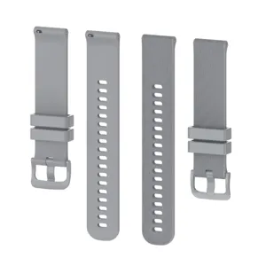 Detailed view of grey silicone watch strap with carbon fiber texture and quick release.