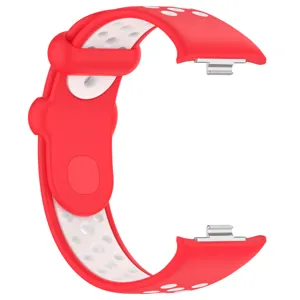 Bracelet de montre de rechange en silicone respirant dote d'un design perfore bicolore.
