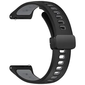 Dettaglio del cinturino in silicone nero per orologio con perni a sgancio rapido e fibbia magnetica.