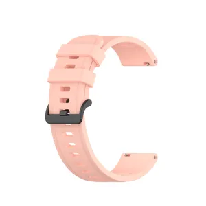 Close-up detail view of pink silicone smartwatch replacement band with black buckle.