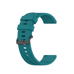 Teal silicone watch strap detail, quick release pin, durable replacement band for smart watch.