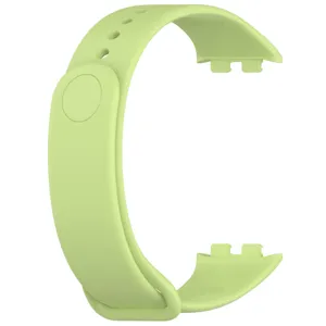 Replacement silicone strap for smart wristband, light green, soft flexible and durable design.