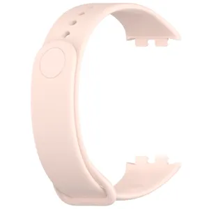 Pink silicone replacement watch strap detail, featuring soft texture and secure snap design.