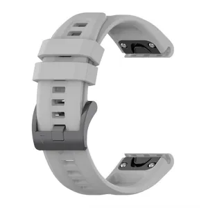 Detailed view of grey silicone replacement watch strap with metal buckle and quick release.