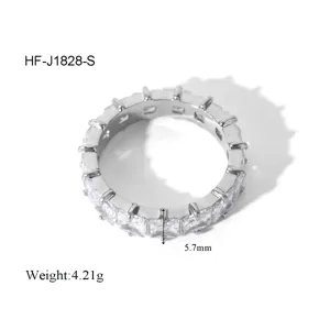 Titanium steel zircon eternity ring with square cut stones, elegant fashion jewelry detail.
