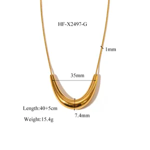 Stainless steel 18K gold plated geometric U-shaped tube pendant necklace detail view.