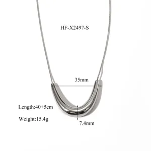 Titanium steel u shaped arc pendant necklace detail, showcasing polished smooth metal texture and size.