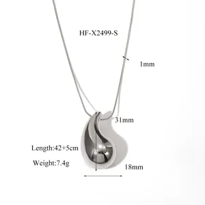 Details of the geometric teardrop pendant necklace, showing precise dimensions and smooth metal finish.