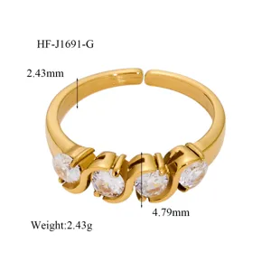 18K gold plated open ring with four sparkling cubic zirconia stones. Elegant detail design.