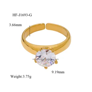 Adjustable 18K gold plated ring featuring a sparkling cubic zirconia stone with detailed dimensions.