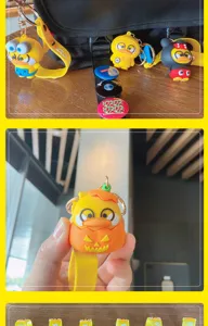 Cartoon PVC duck bag charm and keychain pendant, cute silicone accessories for backpack or keys.