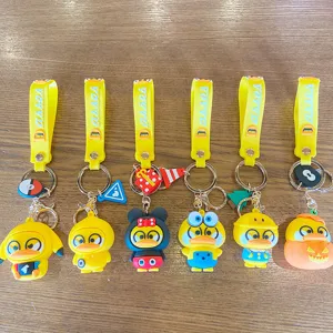 Cute cartoon PVC silicone duck keychain bag pendant set cute character bag charms for kids