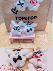 Cute plush puppy keychain with sunglasses and scarf, ideal bag charm and creative gift.