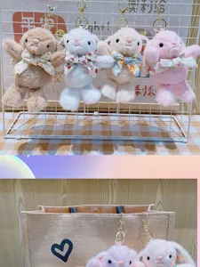 Simpatico portachiavi con coniglio in peluche e fiocco, ciondolo morbido per borsa.