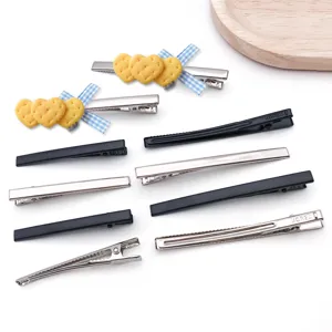DIY hair clips set featuring cute biscuit heart charms, black and silver metal duckbill clips.