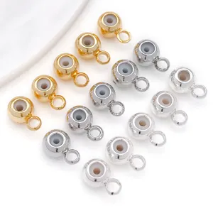 Goud- en zilverkleurige siliconen stopper kralen met oogje voor DIY armbanden en kettingen.