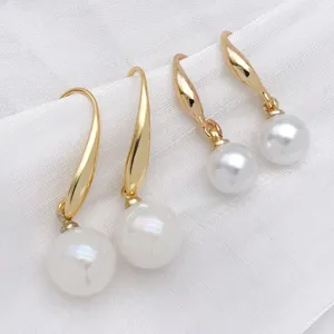 Gold plated pearl drop hook earrings detail shot for DIY jewelry making and daily elegant wear