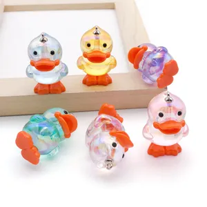 Cute 3D transparent UV plated acrylic duck charms pendants for DIY jewelry accessories.