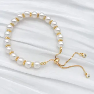 Elegant pearl bracelet with gold beads and adjustable slider chain for women daily wear.