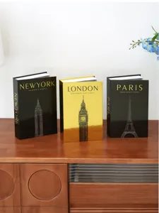 Detailed view of luxury decorative storage book boxes, city theme design, tabletop display.
