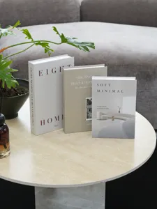 Minimalist decorative fake book model for modern interior design and home staging display.
