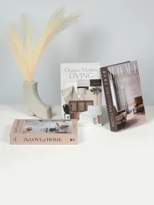Nordic minimalist decorative fake books set with modern ceramic vase for home decor display.