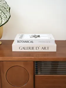 Minimalist botanical decorative book set, artistic floral design fake books for modern home decor.