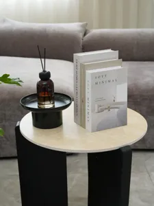 Decorative fake book box set for modern minimalist interior design home decor and staging props.