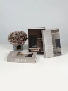 Decorative simulation books set for home and hotel interior staging in Scandinavian style.