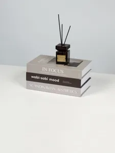 Minimalist decorative faux books set for Nordic home interior styling, elegant book display.