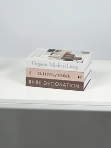 Nordic minimalist decorative faux book box detail, modern home shelf and coffee table decor prop.