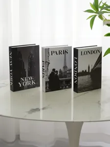 Decorative simulation book detail shot featuring New York, Paris, and London designs for home.
