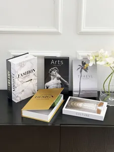 Decorative fake book storage box with openable design for modern coffee table decor.
