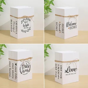 Detailed view of white decorative fake books with English quotes, perfect for modern home decor.