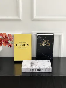 Decorative fake book storage box set detail, luxury coffee table ornament display.