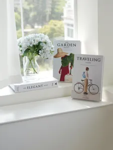 Decorative fake books minimalist photography prop home decor detail shot style aesthetic.